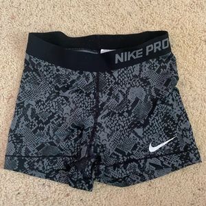 Gray and black Nike Pro shorts